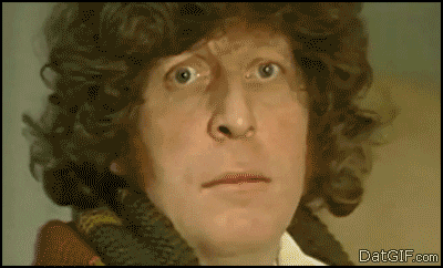 Grinning Tom Baker.